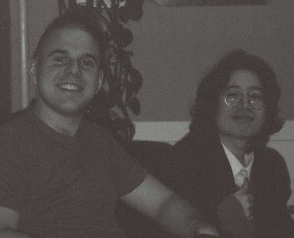 The two Yessirski founders smiling, in black and white